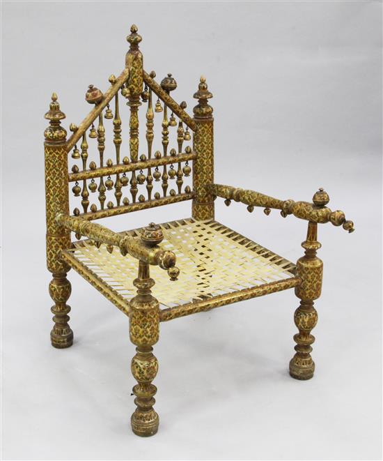 A North Indian parcel gilt and polychrome painted chair,